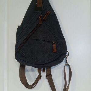 KL928 Sling Backpack Navy Blue Canvas with Brown Leather Trim Accents